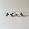 Silver bow tie stud earrings