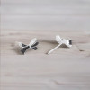 Silver bow tie stud earrings