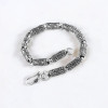 Men's silver cylindrical oxide bracelet with OM motif