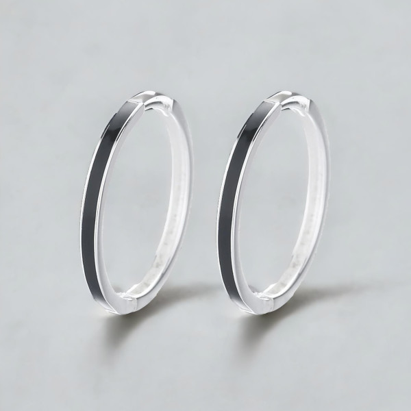 Pendientes criollos de plata con resina negra