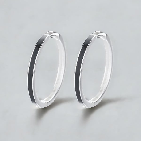 Silver creole earrings with black resin
