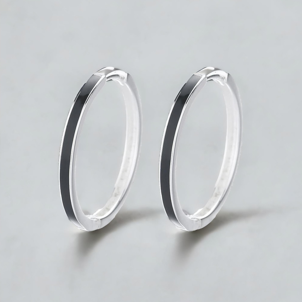 Pendientes criollos de plata con resina negra