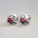 Silver skull stud earrings