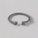Bracelet jonc cuir tressé tête de mort