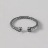 Bracelet jonc cuir tressé tête de mort