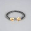 Bracelet jonc cuir tressé tête de mort