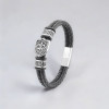 Bracelet cuir tressé fleur de lys
