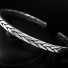 Bracciale rigido intrecciato in argento massiccio per uomo e donna