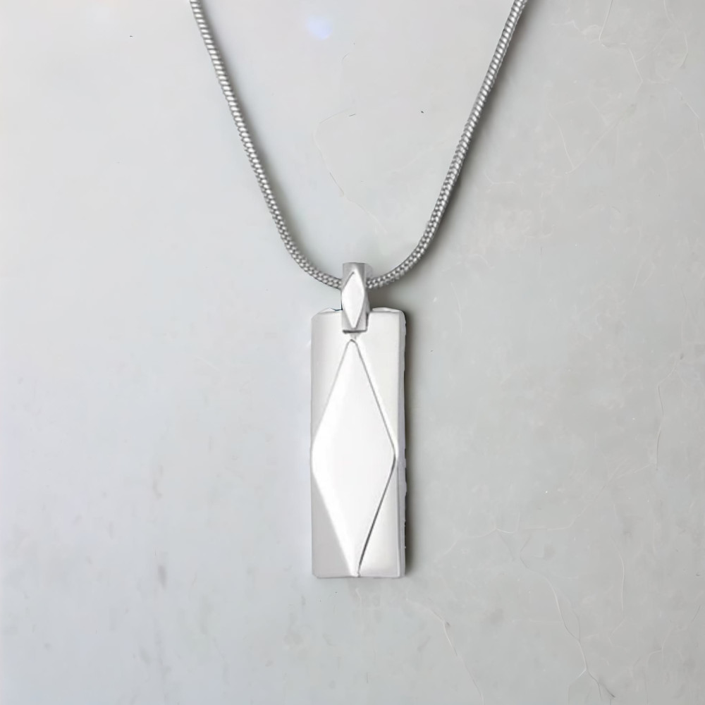 Pendentif barre facetté acier