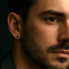 Pendientes redondos de plata para hombre y mujer con circonitas negras.