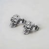 Boucles d'oreilles homme clous acier tete de mort - paire