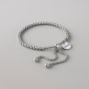 Bracelet personnalise femme gourmette coeur cisele acier plaque or personnalise