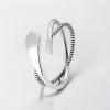 Bague ouverte argent lignes croisees infini