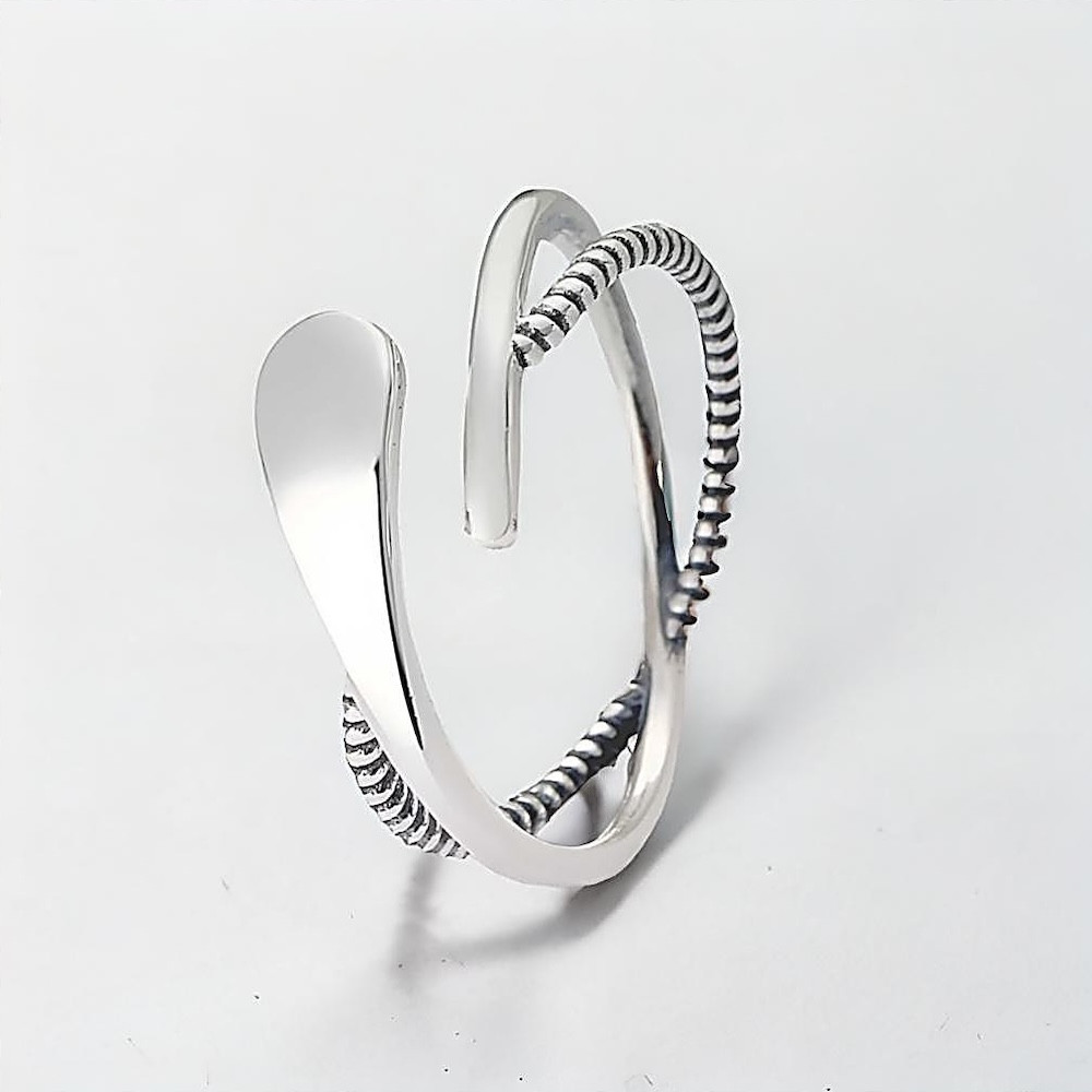Bague ouverte argent lignes croisees infini