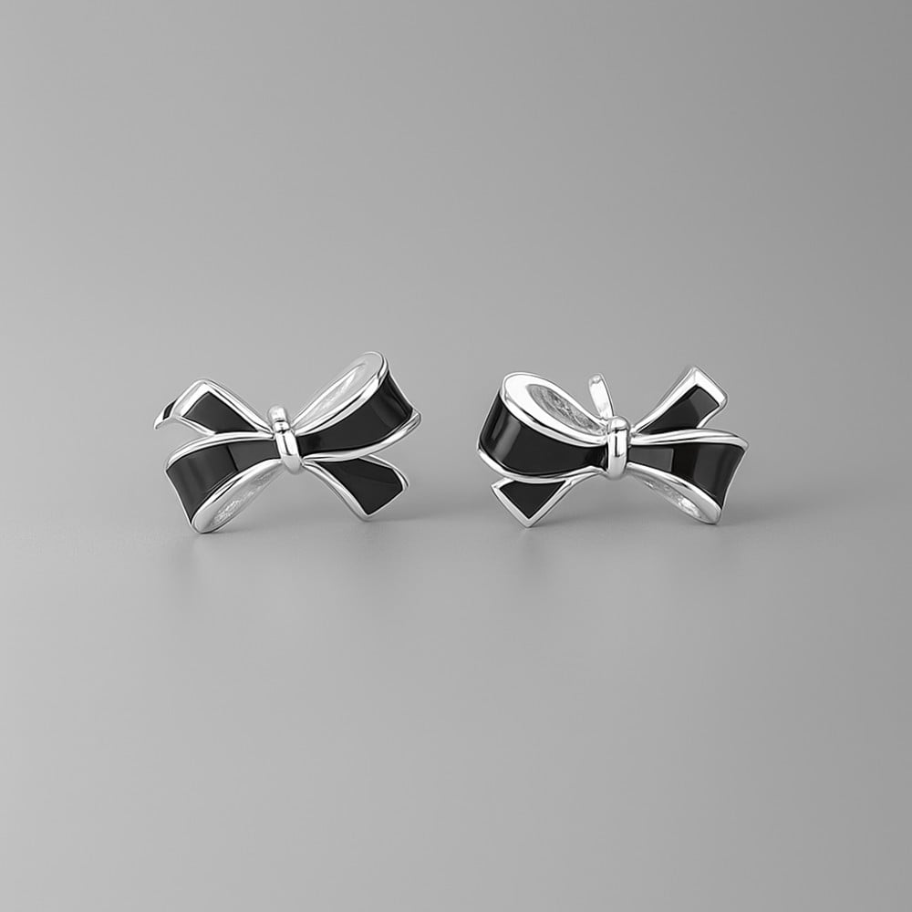 Silver bow tie stud earrings