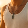 Pendentif homme plaque note de musique clef acier