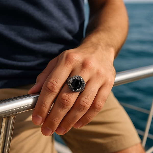Zilveren zegelring met achthoekige onyx steen