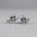 Men's silver earrings with pink skull studs