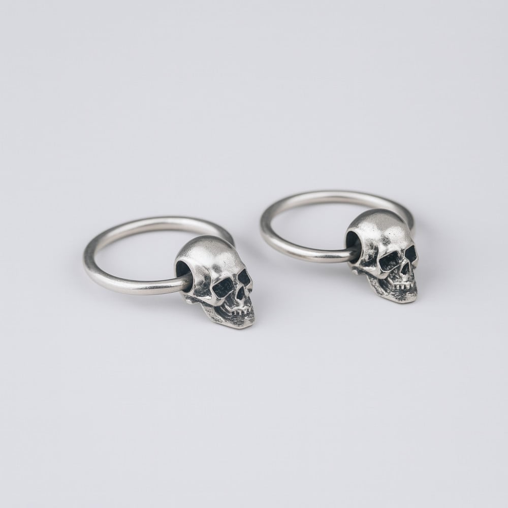 Boucles d'oreilles homme creoles tete de mort argent
