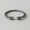 Bracelet jonc cuir tressé tête de mort