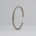 Bracciale rigido in argento intrecciato
