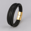Pulsera de hombre de piel negra con múltiples cordones y cierre magnético.