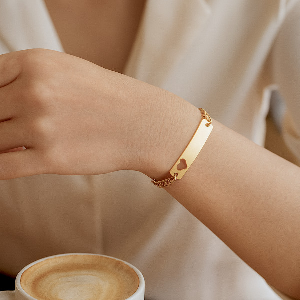 Stainless steel goldplated fantasiearmband met hanger hart met rozenkwartsvoor dames | -NL