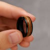 Black ceramic wedding ring with oak wood (Dupliqué)