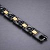 Pulsera de mujer de cerámica negra con baño de oro.