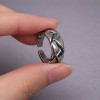 Bague ouverte homme acier tressee