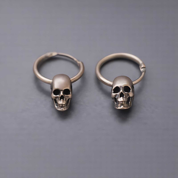 Boucles d'oreilles homme creoles tete de mort argent