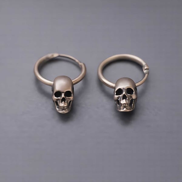 Boucles d'oreilles homme creoles tete de mort argent
