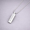 Pendentif barre facetté acier