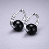 Boucles d'oreilles creoles boule ceramique noire finition polie - paire