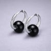 Boucles d'oreilles creoles boule ceramique noire finition polie - paire