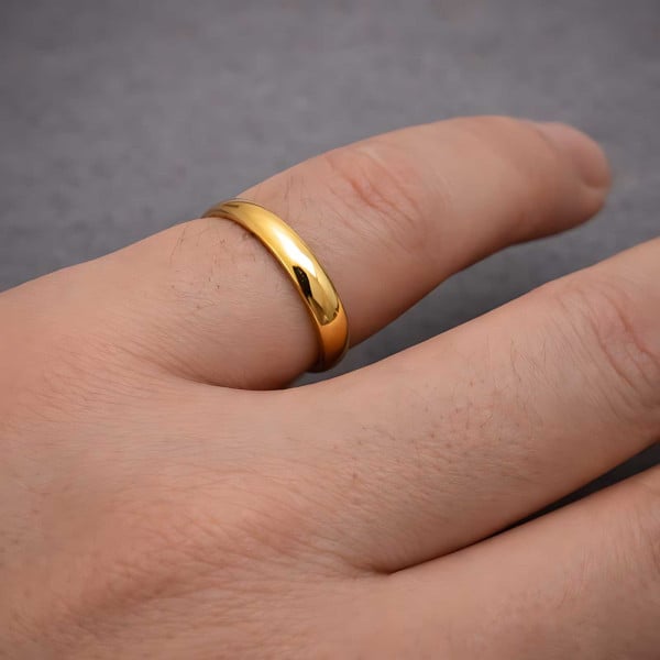 L560 brede gouden trouwringen met strak gezet 0.17 crt. briljant