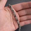 Herenarmband van zilvercilindrisch oxide met OM-patroon