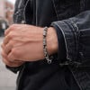 Men's silver cylindrical oxide bracelet with OM motif