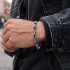 Pulsera de hombre de óxido cilíndrico de plata con estampado OM