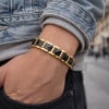Men's black ceramic bracelet with gold plate