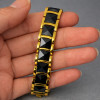 Bracciale da uomo in ceramica nera con placca in oro
