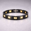 Damesarmband van zwart keramiek met vergulde plaat