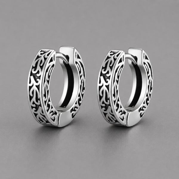 Boucles d'oreilles créoles en acier inoxydable motifs arabesques celtique.