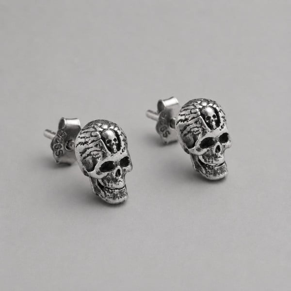 Boucles d'oreilles clous tête de mort en argent 925