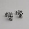 Boucles d'oreilles clous tête de mort en argent 925