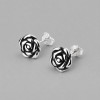 Pendientes de plata 925 con flor rosa.