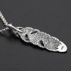 Pendentif argent homme plume tete de mort onyx rouge