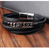 Pulsera de cuero trenzado con múltiples cordones y cierre cruzado de acero.
