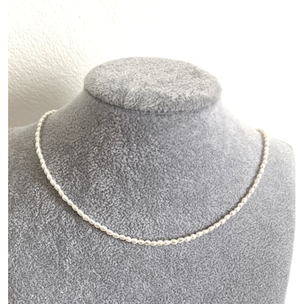 Collana di perle d'acqua dolce ovali bianche AAA da 2-3 mm con chiusura GF 14k