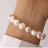 Bracciale barocco con perle d'acqua dolce rosa da 10 mm, chiusura in argento placcato oro